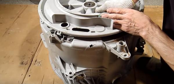 лопнувший бак стиральной машины